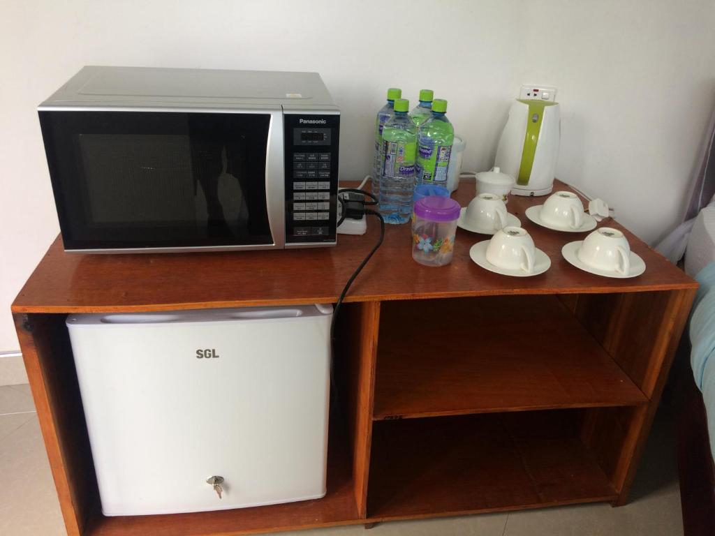 Kuchyň nebo kuchyňský kout v ubytování Sunray Homestay