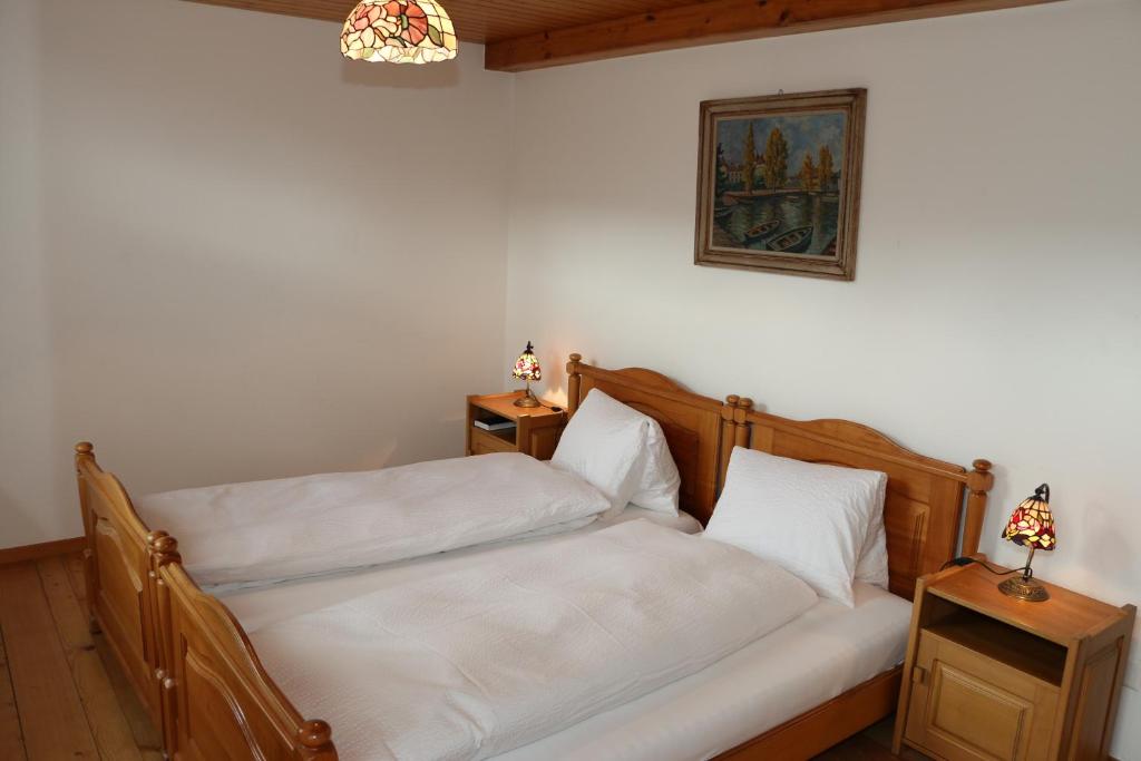 Postel nebo postele na pokoji v ubytování Hotel Lowen