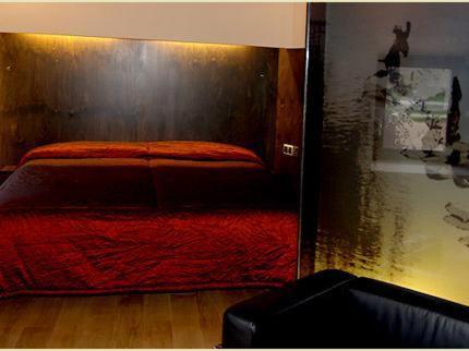 Postel nebo postele na pokoji v ubytování Hotel Boutique El Convento de Mave