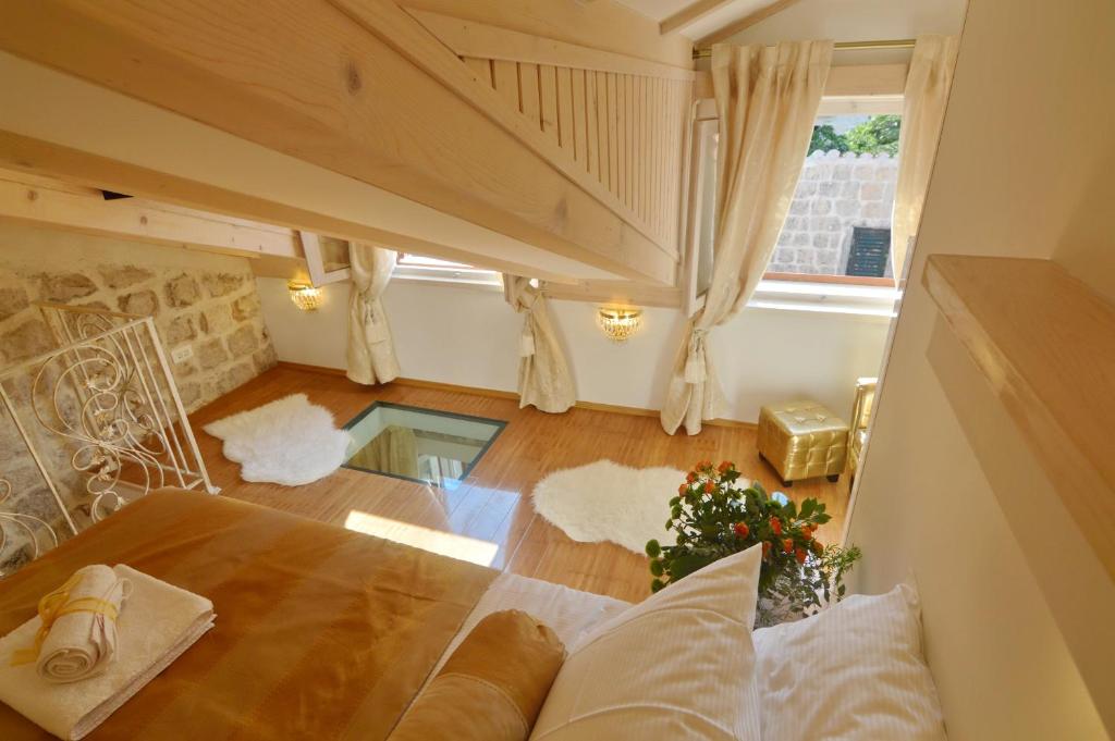 an overhead view of a living room with a staircase at Villa Madonna della Strada A5 in Dubrovnik