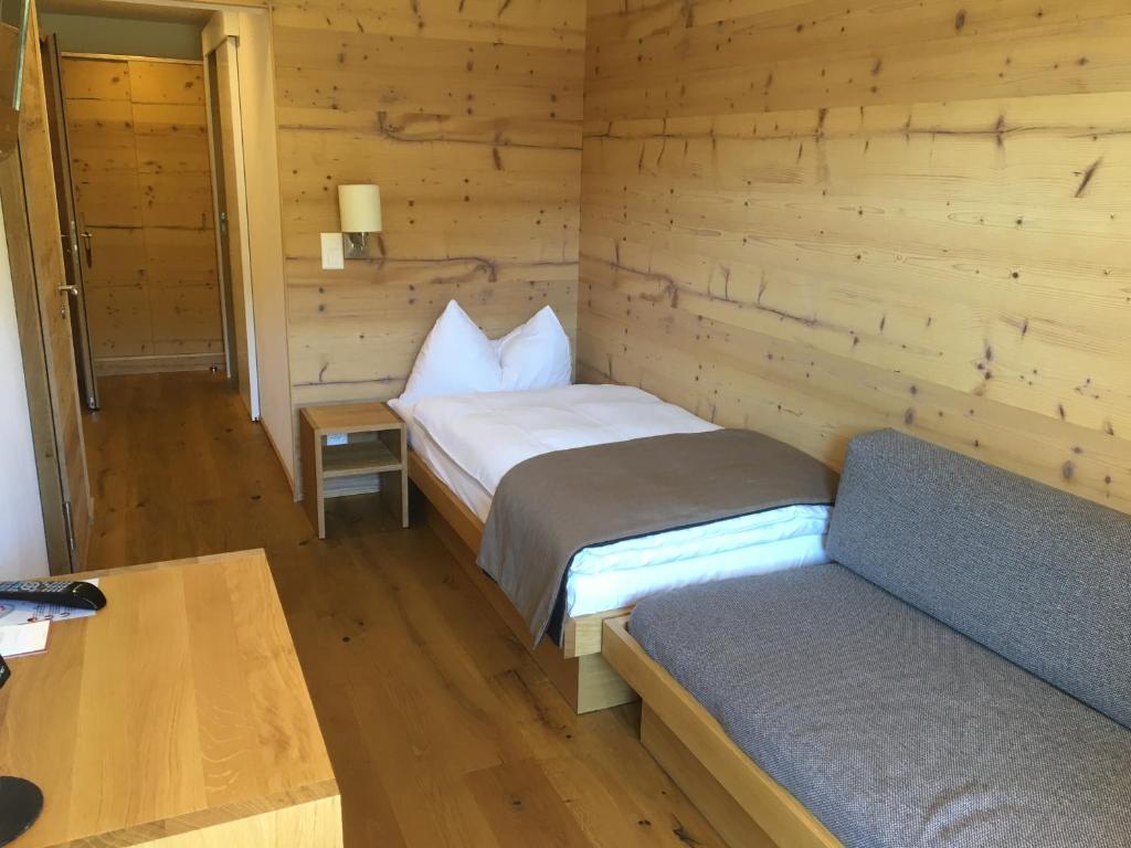 Postel nebo postele na pokoji v ubytování Hotel Bettmerhof