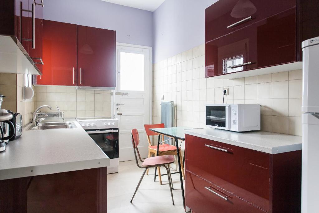 Kuchyňa alebo kuchynka v ubytovaní Athens Vintage Apartments - Ilisia