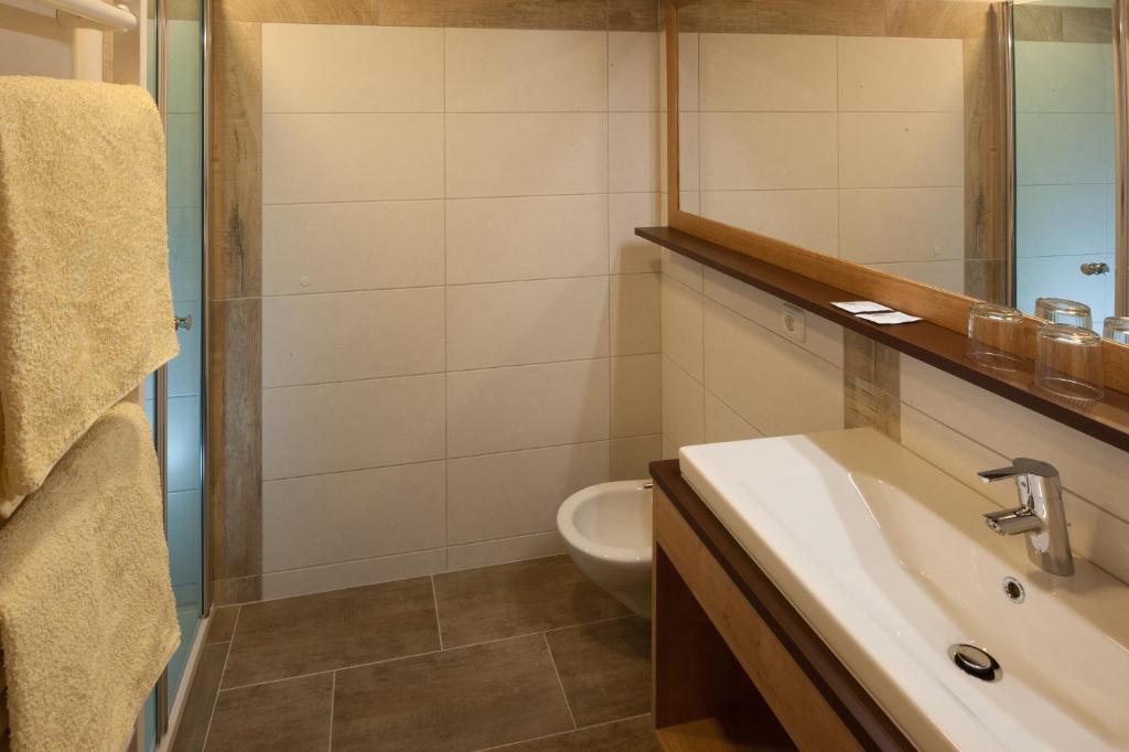 Koupelna v ubytování Hotel Sonnalpen