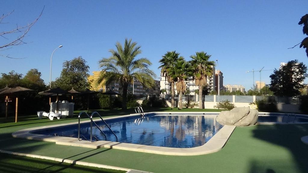 Bazén v ubytování Aпартаменты в San Juan Playa nebo v jeho okolí