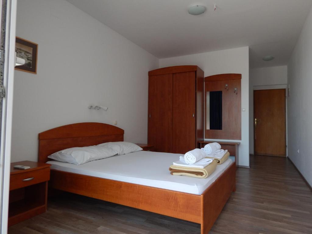 Postel nebo postele na pokoji v ubytování Boarding house Vide