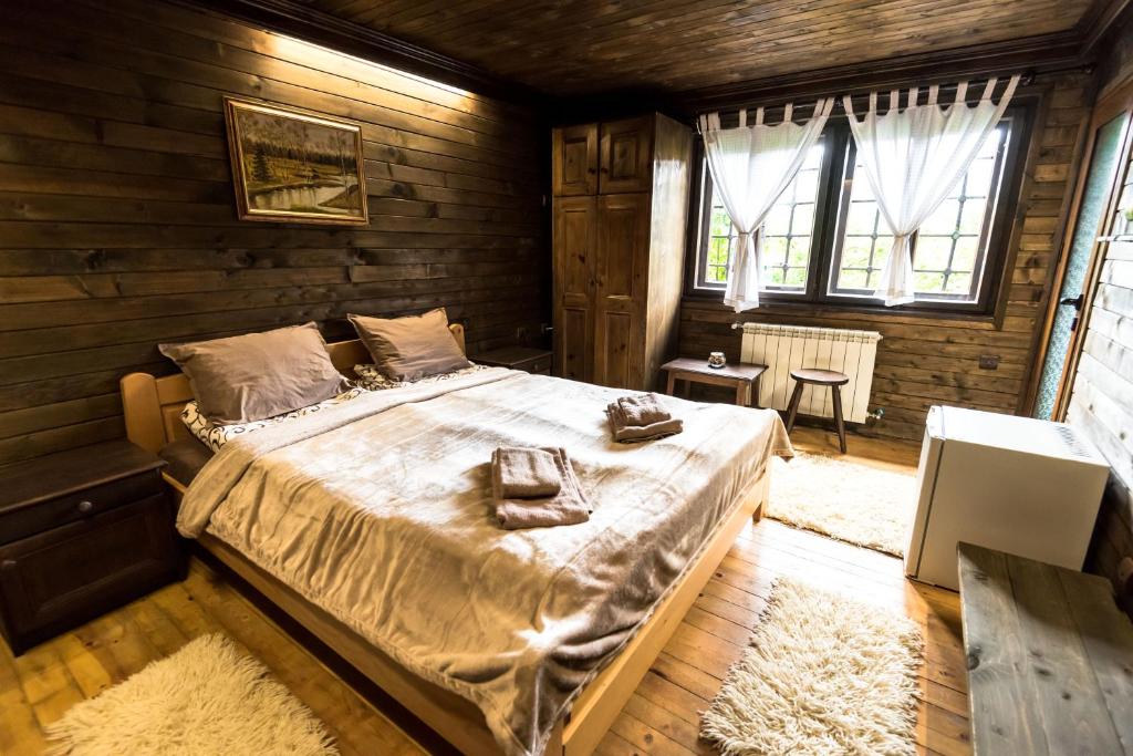 Postel nebo postele na pokoji v ubytování Banskovilla Zlateva House