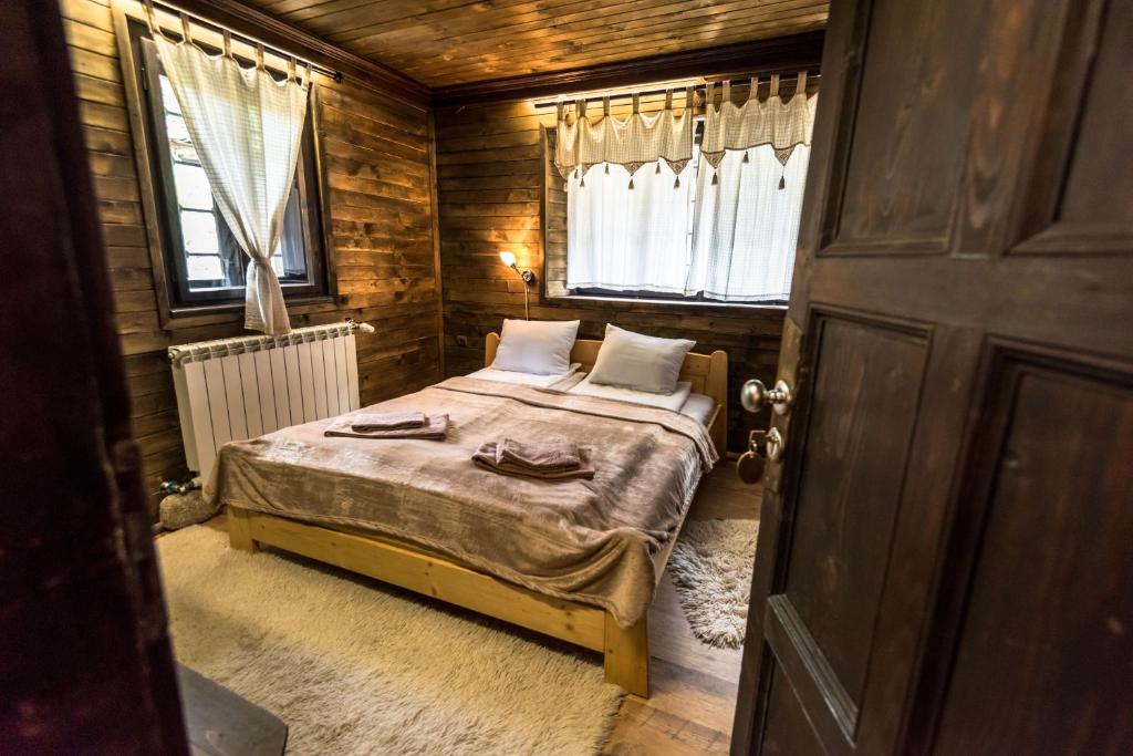 Postel nebo postele na pokoji v ubytování Banskovilla Zlateva House