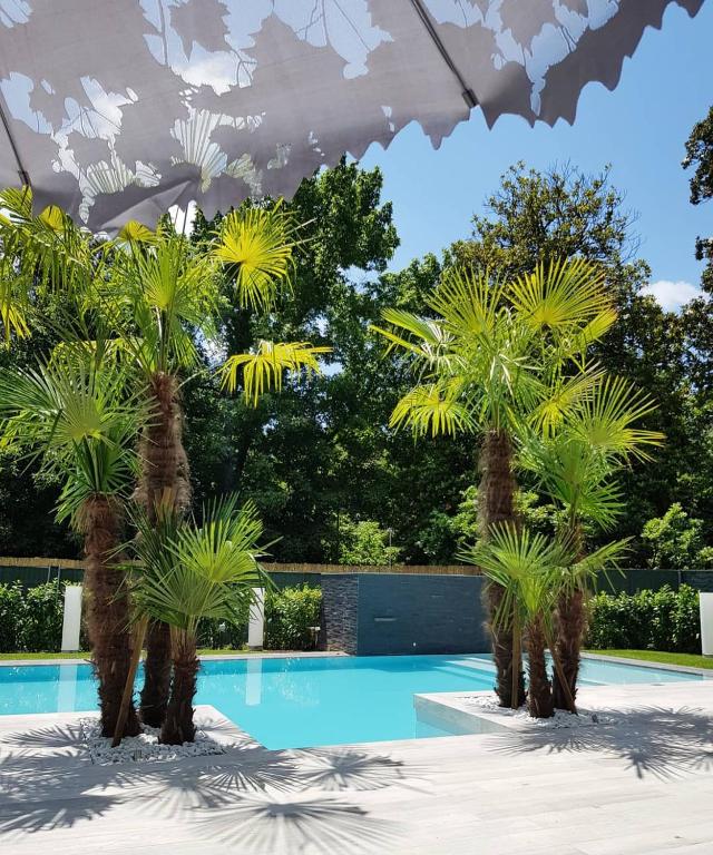 Bazén v ubytování Hotel Hambros - Il Parco in Villa Banchieri nebo v jeho okolí