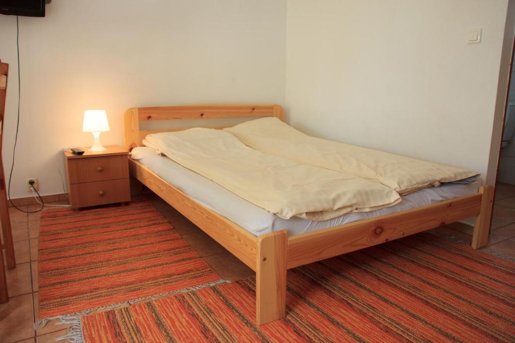 Postel nebo postele na pokoji v ubytování Pod Jesionem