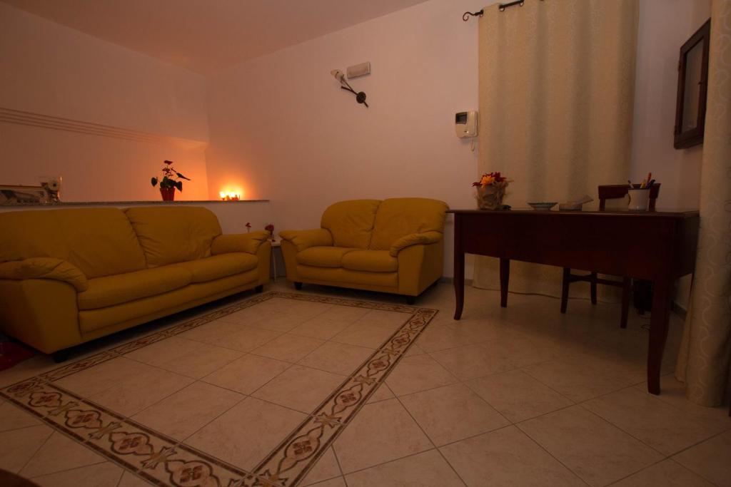 Posezení v ubytování Noto Bedda Bed&Breakfast
