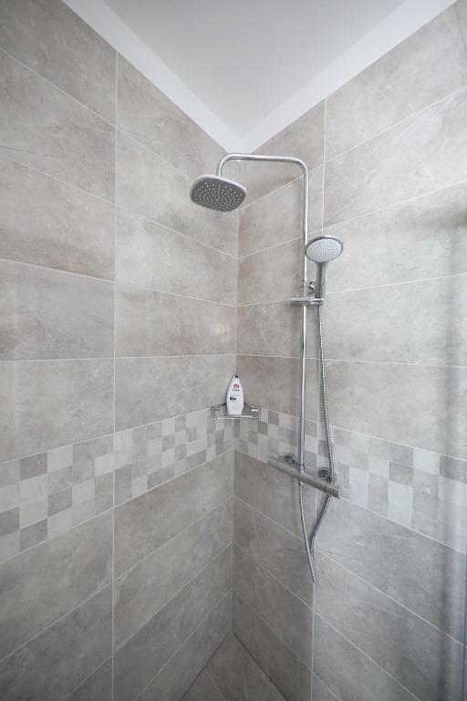 Kúpeľňa v ubytovaní Apartmani Postimana