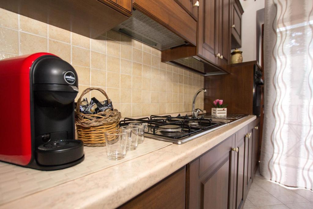 Kuchyň nebo kuchyňský kout v ubytování Noto Bedda Bed&Breakfast