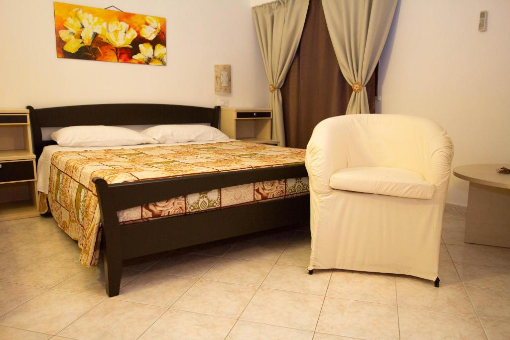 Postel nebo postele na pokoji v ubytování Noto Bedda Bed&Breakfast
