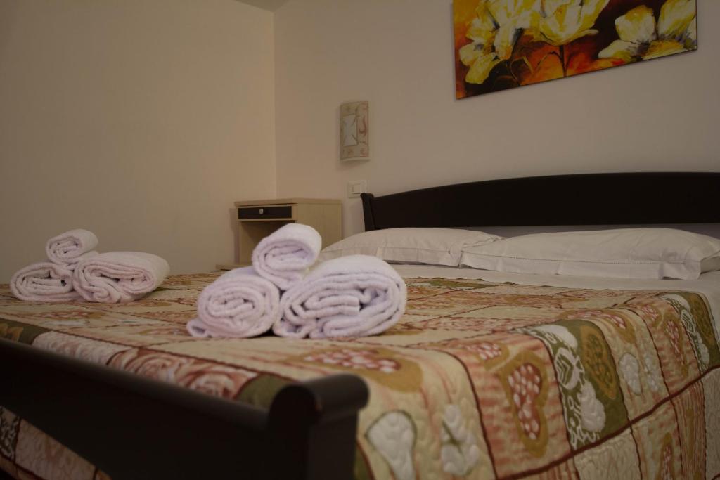 Postel nebo postele na pokoji v ubytování Noto Bedda Bed&Breakfast