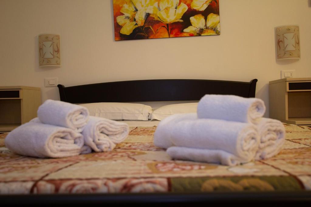 Postel nebo postele na pokoji v ubytování Noto Bedda Bed&Breakfast