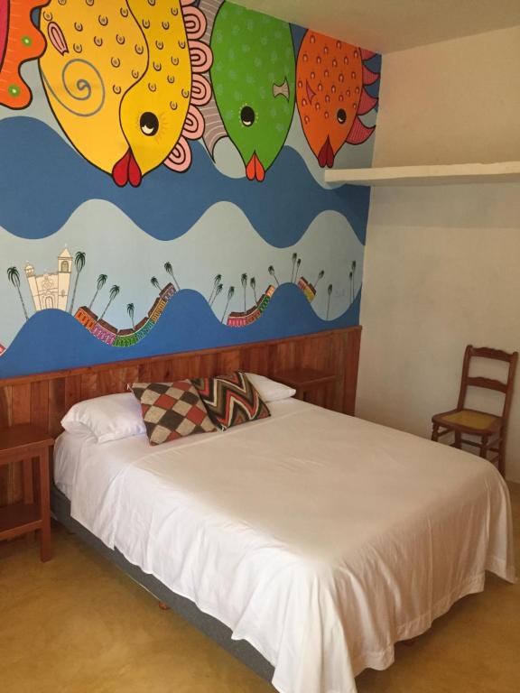 Postel nebo postele na pokoji v ubytování Casa De La Luz - Guesthouse