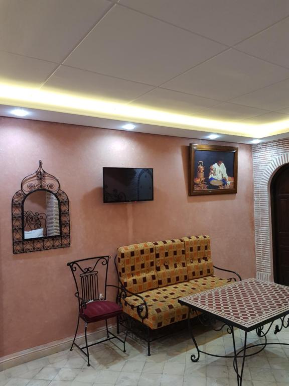 TV a/nebo společenská místnost v ubytování Hotel Salsabil