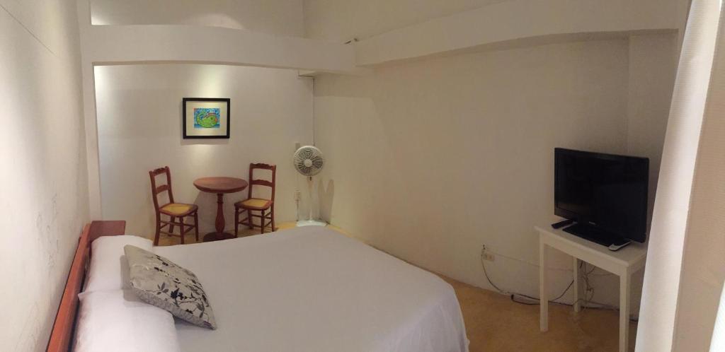 TV a/nebo společenská místnost v ubytování Casa De La Luz - Guesthouse