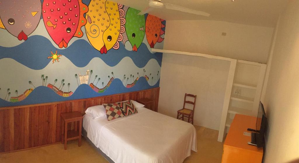 Postel nebo postele na pokoji v ubytování Casa De La Luz - Guesthouse