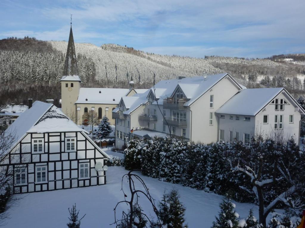 Hotel Bigger Hof - Wirtshaus Platzhirsch am Jahnplatz v zimě