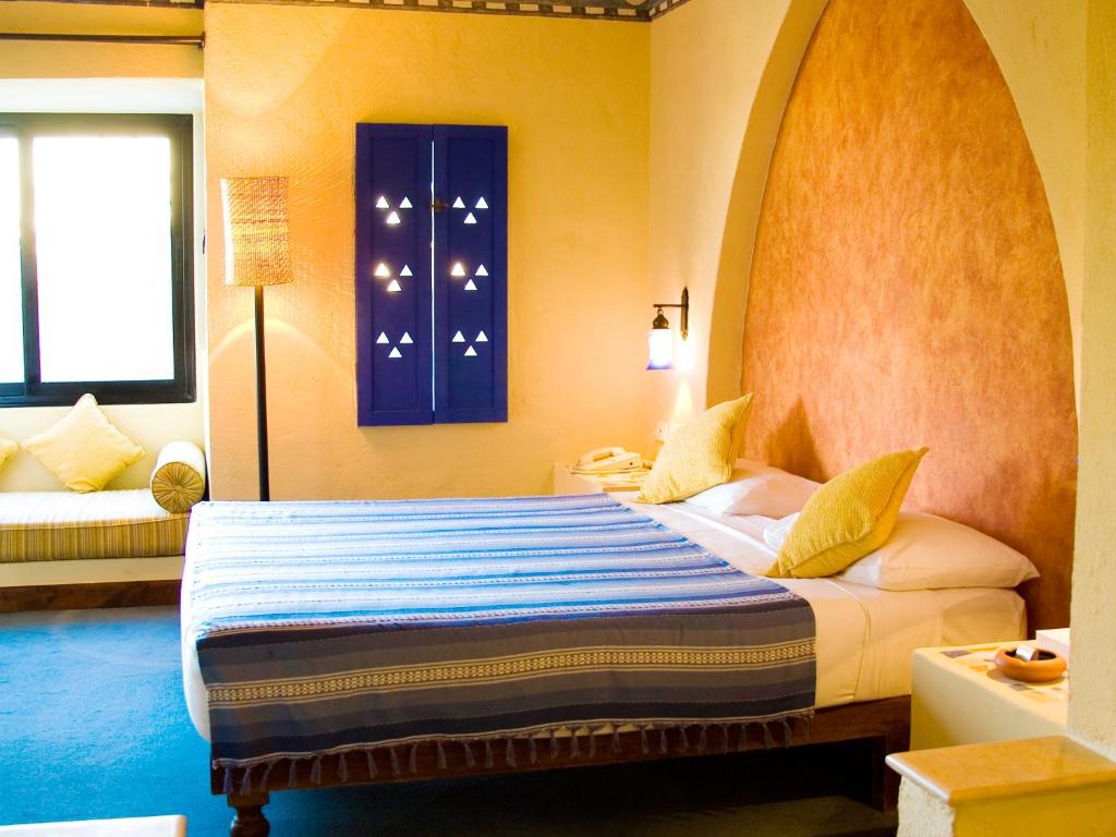 Postel nebo postele na pokoji v ubytování Marina Lodge at Port Ghalib