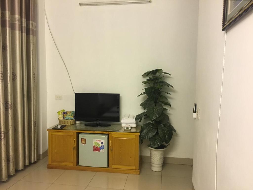 TV a/nebo společenská místnost v ubytování Hotel Hoang Gia