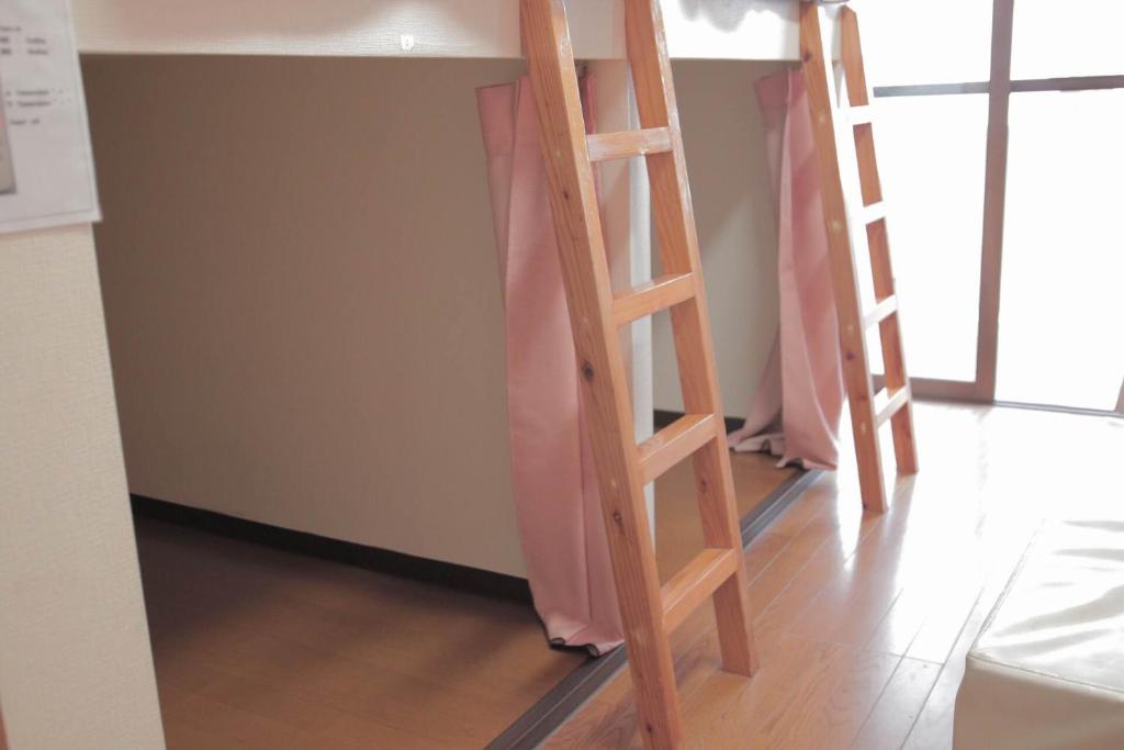 Postel nebo postele na pokoji v ubytování Green Guesthouse