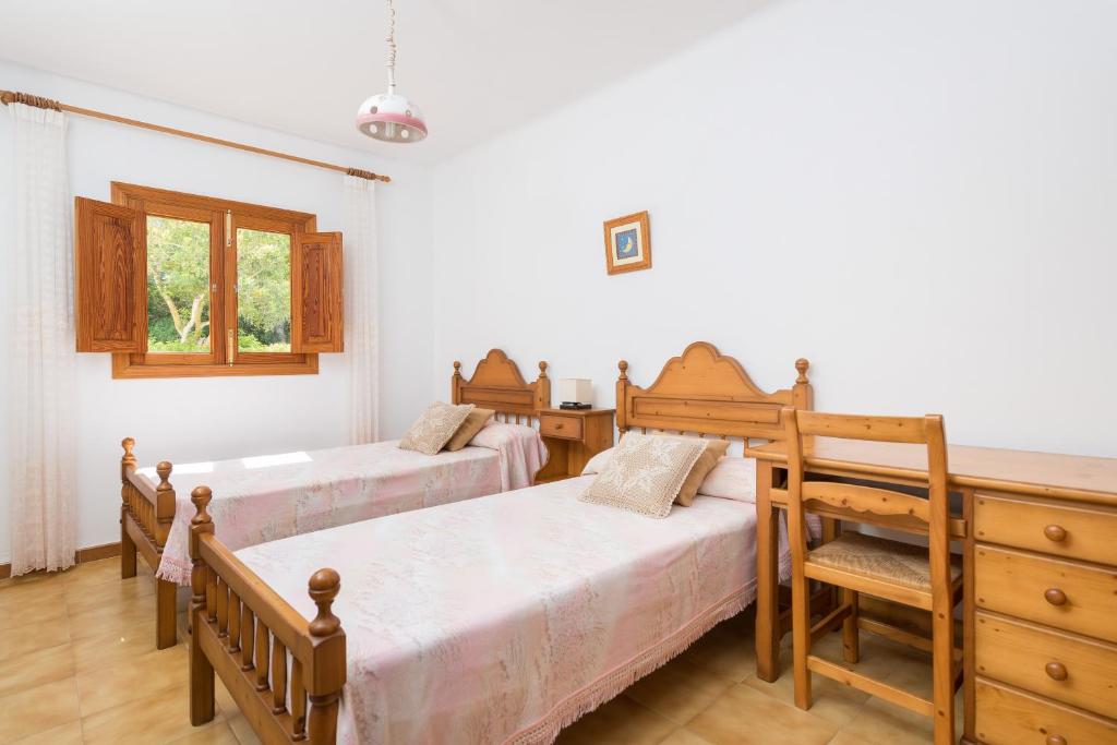 Postel nebo postele na pokoji v ubytování Barcelo-Danus
