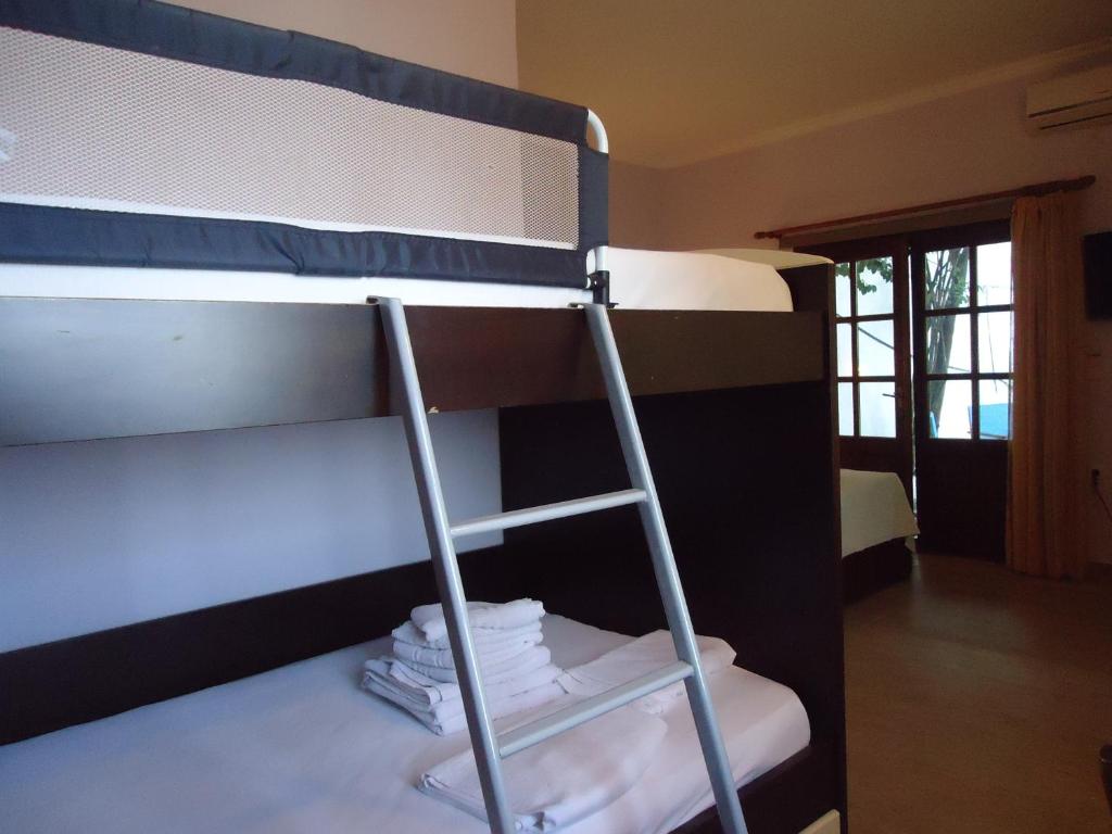 Postel nebo postele na pokoji v ubytování Eden Hotel