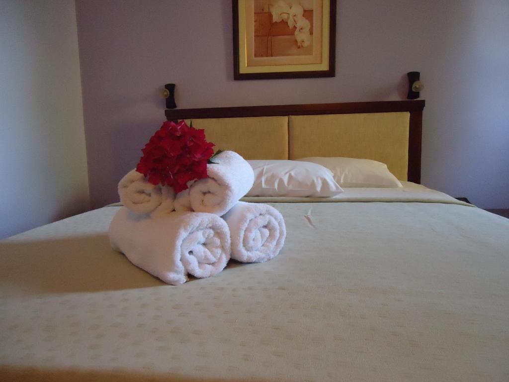 Postel nebo postele na pokoji v ubytování Eden Hotel