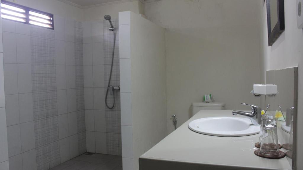 Koupelna v ubytování Gerhana Sari 2 Bungalows