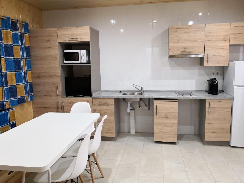 Kuchyň nebo kuchyňský kout v ubytování Camping Bon Repós