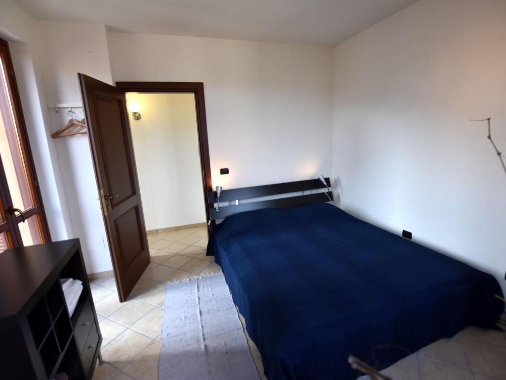 Postel nebo postele na pokoji v ubytování Apartment in Belvedere Langhe with Wine Views