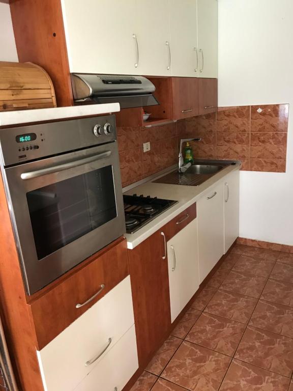 Kuchyňa alebo kuchynka v ubytovaní City Apartment Sonya