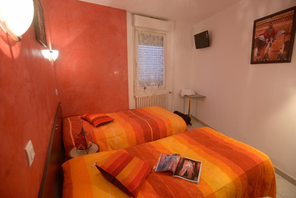Postel nebo postele na pokoji v ubytování L'Acilya