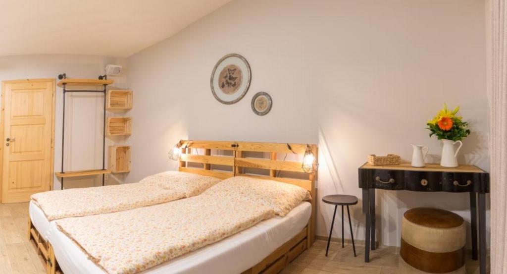 Postel nebo postele na pokoji v ubytování Smrcina Resort