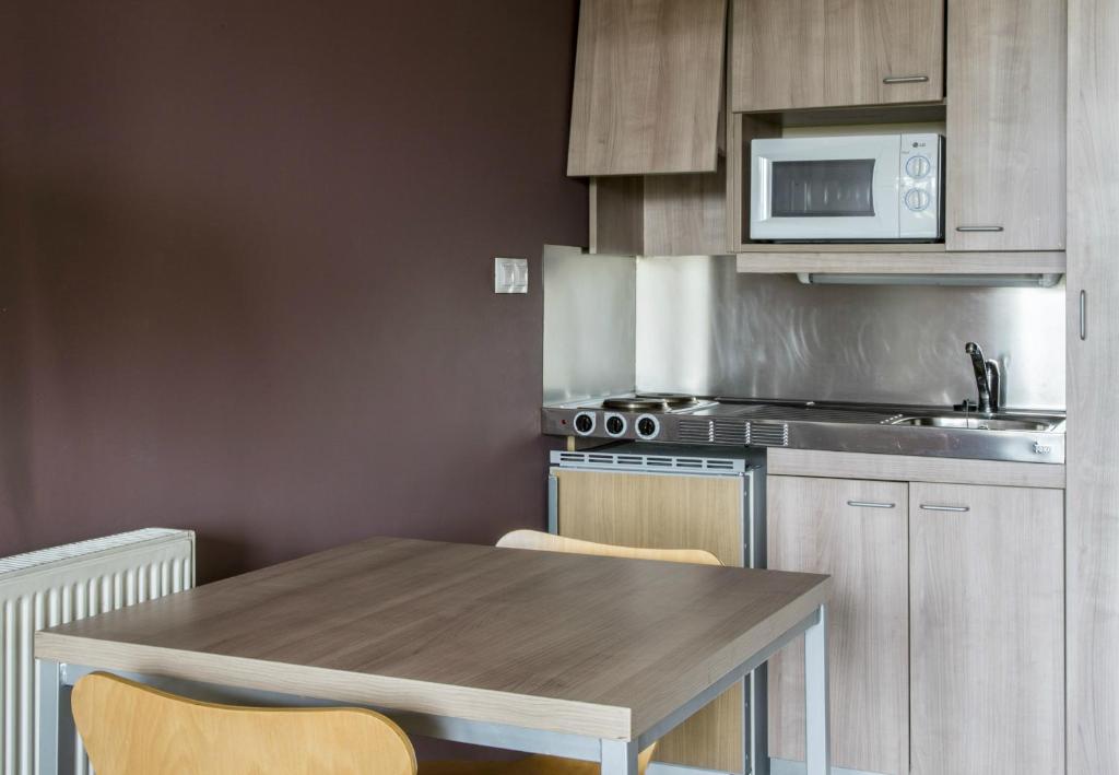 Kuchyň nebo kuchyňský kout v ubytování Residencia Universitaria Resa Hernan Cortes