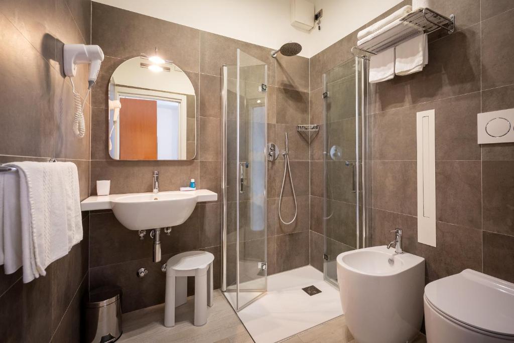 Kúpeľňa v ubytovaní Hotel Delfino