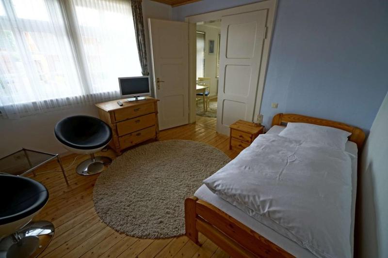 Postel nebo postele na pokoji v ubytování Lindenzimmer Stöcken