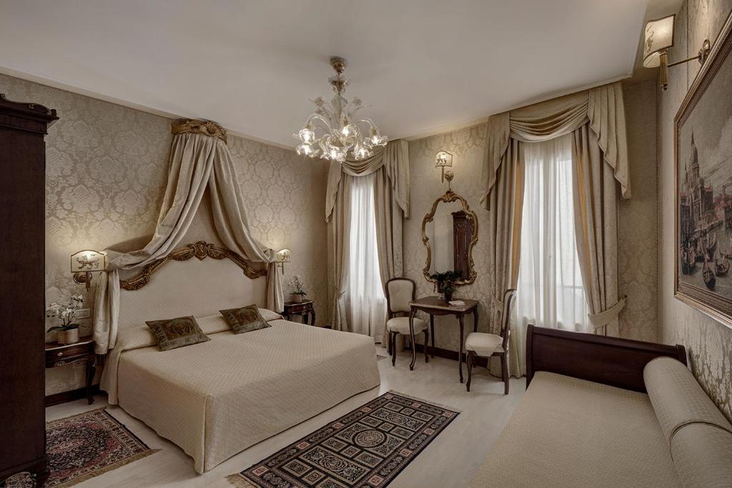 Posteľ alebo postele v izbe v ubytovaní B&B Ca' Bonvicini