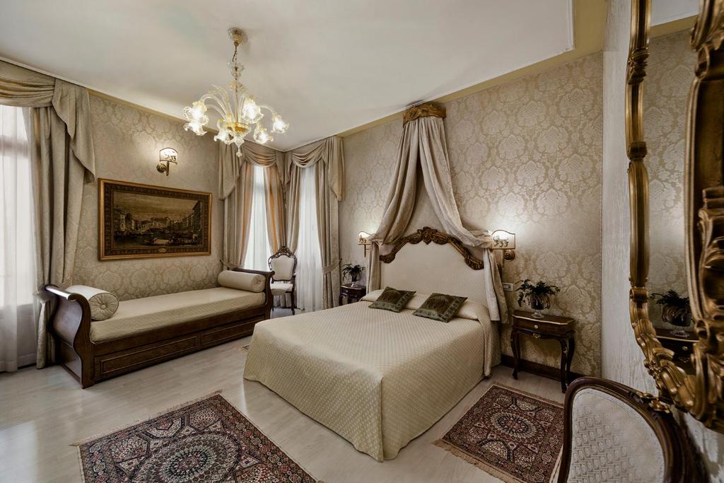 Posteľ alebo postele v izbe v ubytovaní B&B Ca' Bonvicini