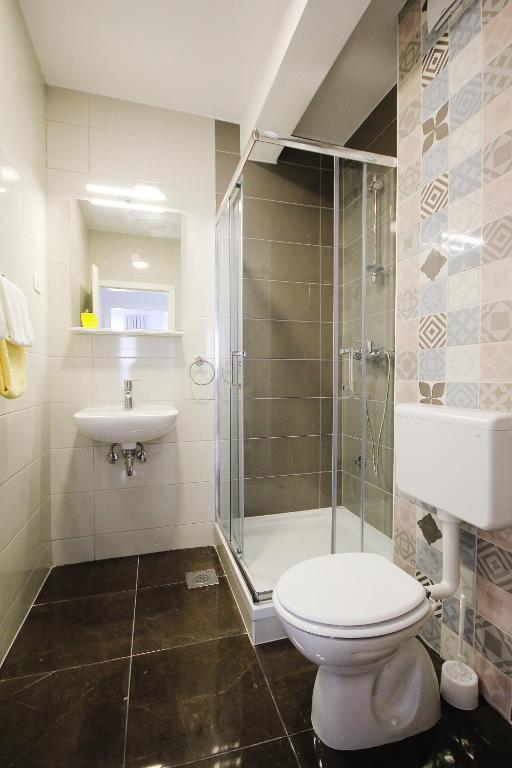 Kúpeľňa v ubytovaní Apartmani Lovre