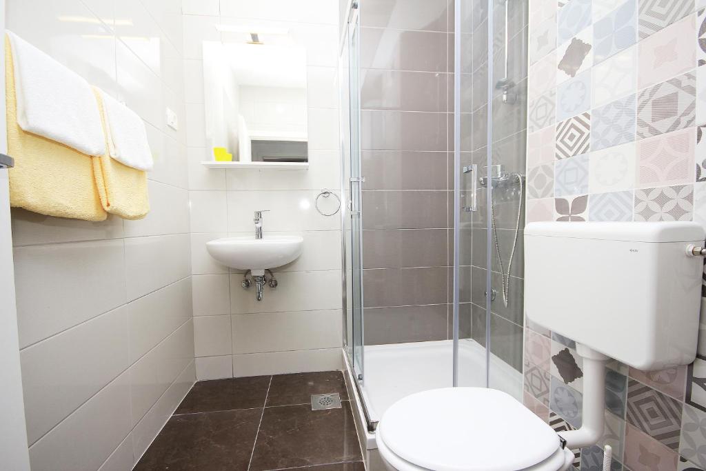 Kúpeľňa v ubytovaní Apartmani Lovre