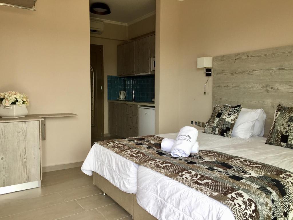 Posteľ alebo postele v izbe v ubytovaní Royalty Suites Loft