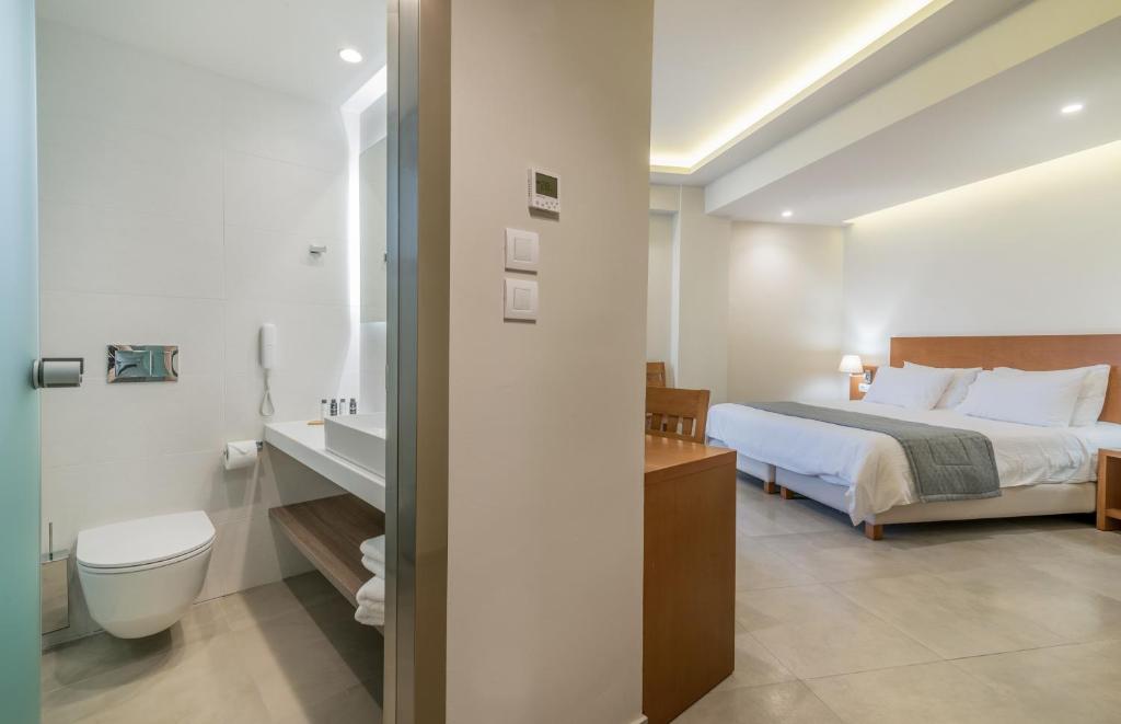Postel nebo postele na pokoji v ubytování Hotel Palmyra