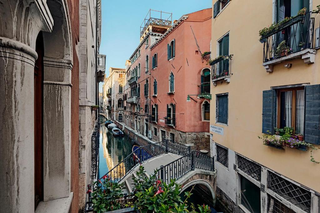 a view of a canal between two buildings at B&B Ca' Bonvicini in Venice