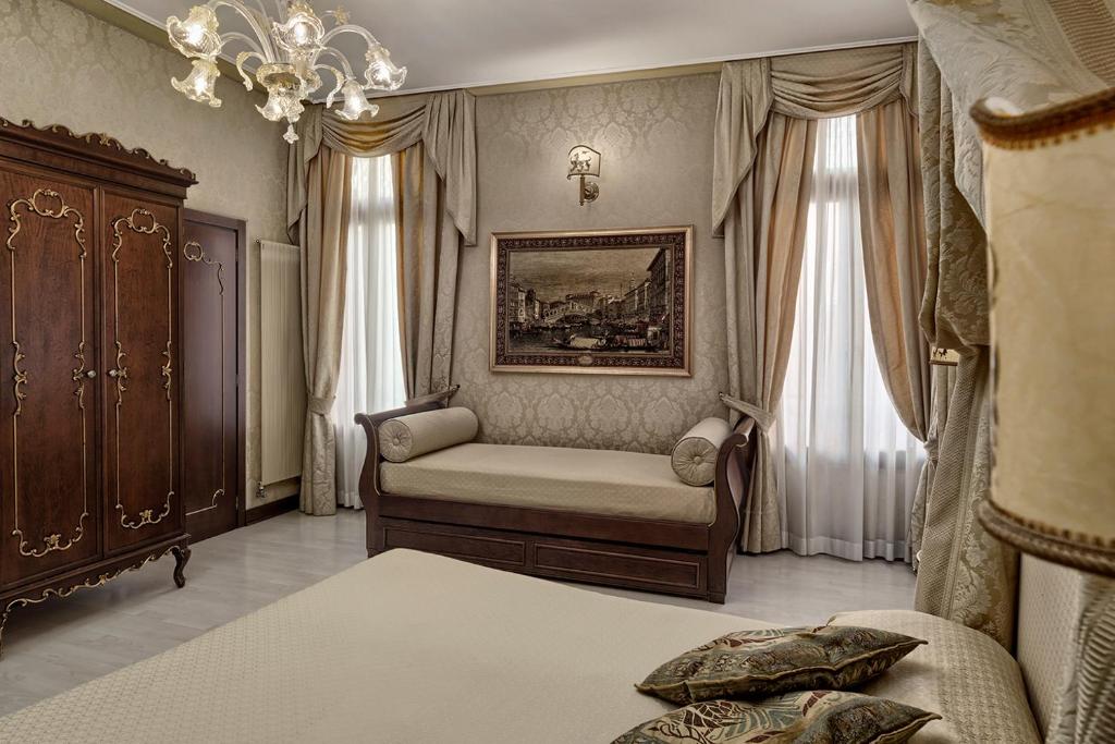 Posteľ alebo postele v izbe v ubytovaní B&B Ca' Bonvicini