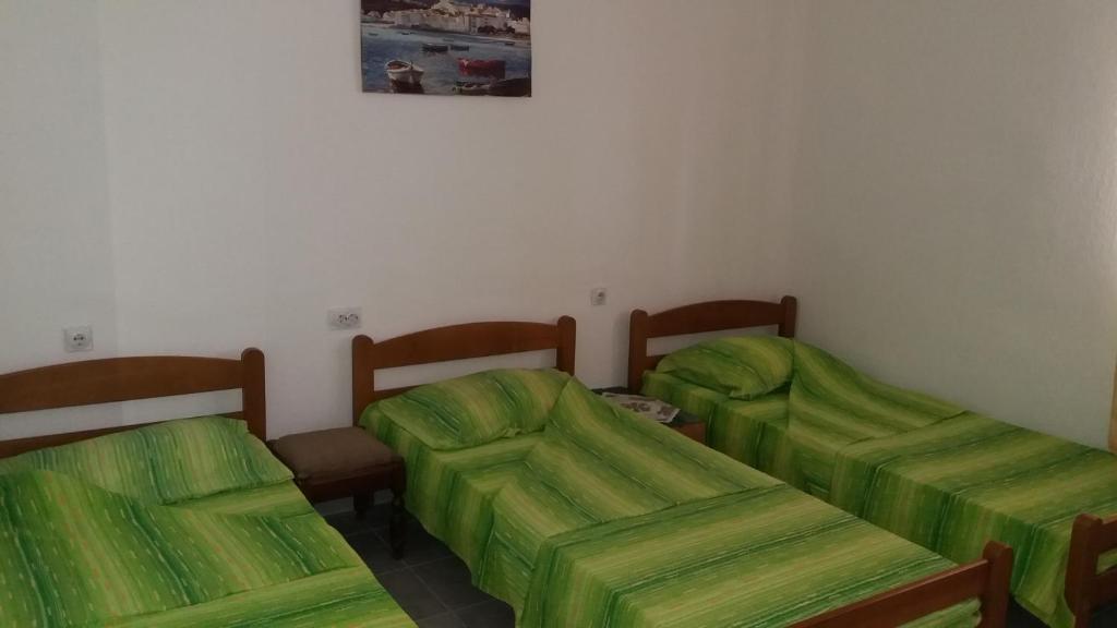Postel nebo postele na pokoji v ubytování Rooms Sijak