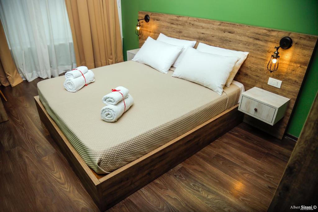 Postel nebo postele na pokoji v ubytování Arc Hotel Tirana