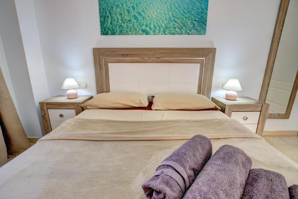 Postel nebo postele na pokoji v ubytování Your Ocean Suite